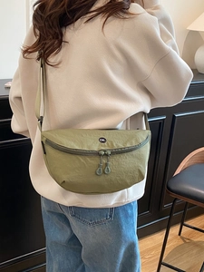 Elegant grass green crescent crossbody bag for women made of durable nylon fabric