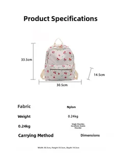 Detail view of cherry print nylon backpack showing dimensions 30.5x33.5x14.5cm and 0.24kg weight