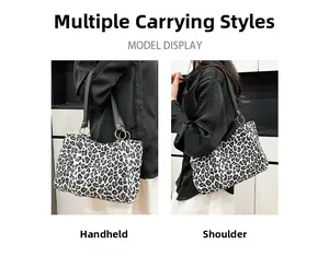 Leopard print tote bag with black straps showing handheld and shoulder carrying styles