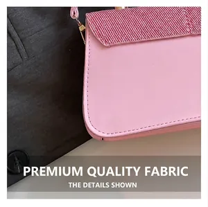 Detail of pink leather and woven fabric stitching with fine craftsmanship and gold buckle
