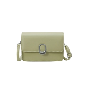 Minimalist pistachio green square crossbody bag with silver oval twist lock buckle