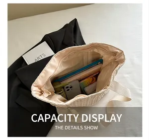 Spacious interior of beige woven tote bag with zipper pocket for beach and vacation