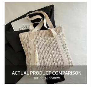 Detail of woven tote bag texture with long fringe tassel and wide shoulder strap