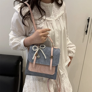 Blue denim and pink leather patchwork small backpack for women with pearl bow detail