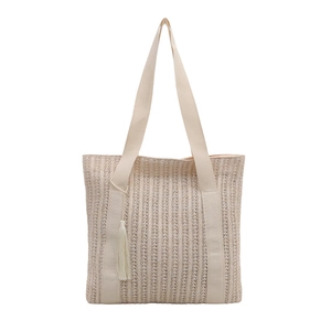 Minimalist straw woven tote bag with fringe tassel and wide shoulder straps for summer