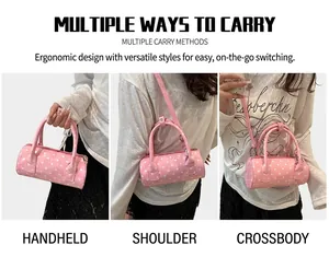 Polka dot cylinder bag showing versatile carrying styles: handbag, shoulder and crossbody modes