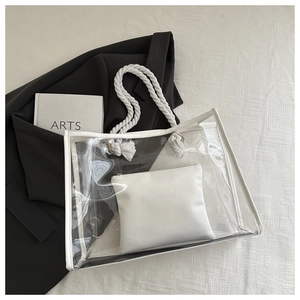 Transparente PVC-Tasche mit weißen Baumwollseilgriffen und passender Innentasche