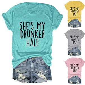 Flat lay of women's She's My Drunker Half t-shirts and denim shorts in four colors