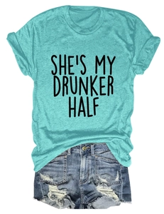 Detail of teal crew neck T-shirt with She's My Drunker Half print and ripped denim shorts