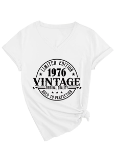 Close-up of V-neck white cotton T-shirt featuring a vintage 1976 printed logo design