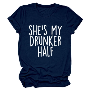 Detail of rolled cuffs and SHE'S MY DRUNKER HALF script on navy crew neck cotton T-shirt