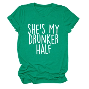 Flat lay of a green crew neck T-shirt featuring She's My Drunker Half white typography