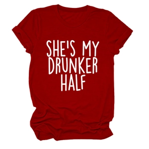 Detailed view of dark red cotton T-shirt featuring SHE'S MY DRUNKER HALF white text