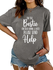 Detail of dark gray crew neck T-shirt featuring 'I'm the Bestie' slogan and soft cotton texture