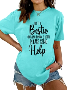 Close-up of turquoise crewneck t-shirt with I'M THE BESTIE humor slogan print