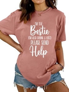 Close-up of pink crewneck T-shirt with I'm the Bestie print and cotton texture
