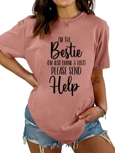Detail of dusty pink T-shirt featuring I'm the bestie slogan with denim shorts