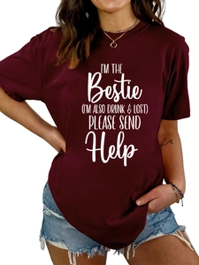 Close-up of crew neck design and white bestie text print on burgundy cotton T-shirt
