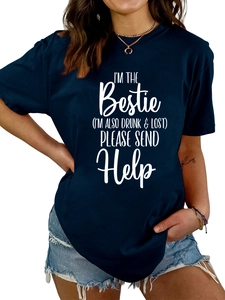 Detail of navy blue t-shirt with I'M THE BESTIE white slogan print on cotton fabric