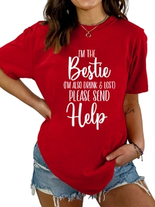Detail of red crew neck t-shirt with I'M THE BESTIE white slogan graphic print