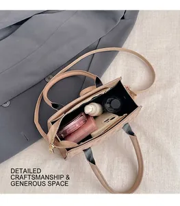 Top view of quilted beige handbag interior showing spacious capacity for cosmetics and phone