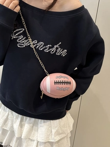 Pink rugby-shaped crossbody bag with white stripes and gold chain strap for women