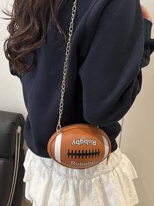 Creative rugby-shaped cylinder bag with brown pebbled texture and gold chain strap