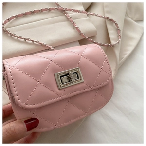 Detail of pink quilted mini crossbody bag with silver twist lock and chain strap