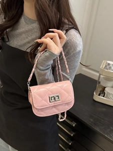 Pink quilted leather crossbody chain bag with silver twist lock and lattice pattern