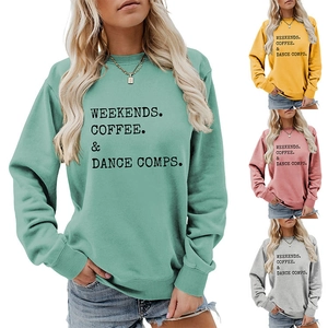 Detail view of cotton sweatshirts in mint, yellow, pink, and grey with letter print