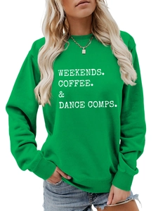 Detail of emerald green sweatshirt showing ribbed cuffs and Weekends Coffee printed letters