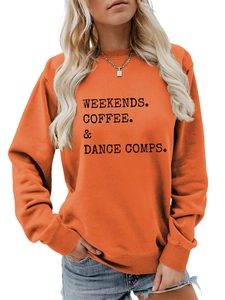 Detail of orange crewneck sweatshirt featuring black WEEKENDS COFFEE DANCE lettering
