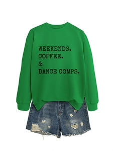 Flat lay of green crewneck sweatshirt and distressed denim shorts casual two-piece set