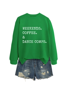 Detail of green crewneck sweatshirt with WEEKENDS COFFEE DANCE print and denim shorts