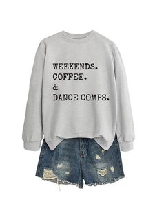 Flat lay of grey crewneck sweatshirt with WEEKENDS COFFEE DANCE print and denim shorts