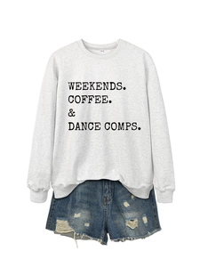 Detail of Weekends Coffee Dance print on gray sweatshirt with distressed denim shorts