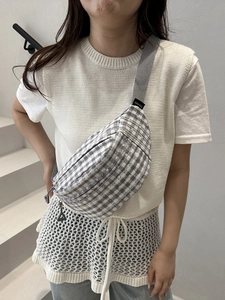 Chic grey and white plaid crossbody fanny pack with adjustable woven strap for women