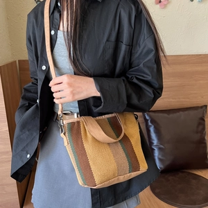 Women's large capacity striped canvas tote bag with adjustable shoulder strap