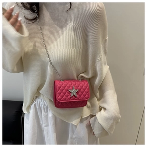 Detail of rose red mini crossbody bag with diamond quilting and rhinestone star icon