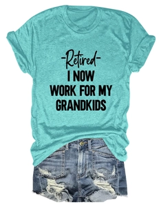 Detail view of blue cotton T-shirt with grandkids slogan and distressed denim shorts