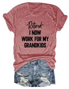 Detail of retired theme slogan print on casual crewneck t-shirt with denim shorts