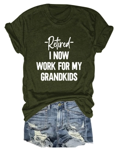 Olive green graphic tee with white slogan and distressed denim shorts flat lay