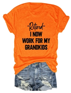 Detail of orange t-shirt with 'Retired' slogan paired with distressed denim shorts