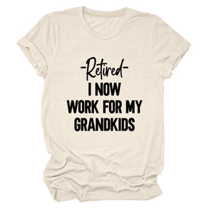 Macro detail of Retired I Now Work For My Grandkids print on beige cotton t-shirt