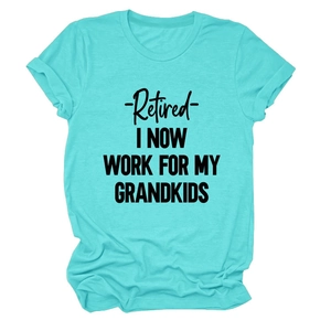 Close-up of the teal cotton T-shirt featuring Retired I Now Work For My Grandkids slogan