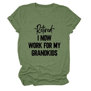 Detail of the knit fabric texture and 'Retired' slogan on a green casual cotton T-shirt