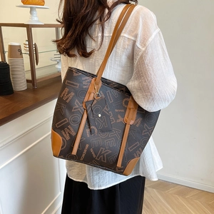 Chic monogram tote bag with large capacity and matching pouch for casual daily use