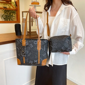 Women's black letter print tote bag set with matching small crossbody bag