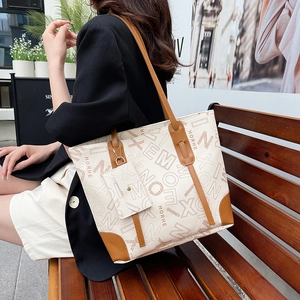 Fashionable large tote bag set with HORHE monogram print and brown leather handles