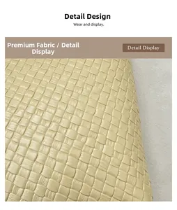 Macro shot of beige woven leather texture on a stylish summer bucket shoulder bag